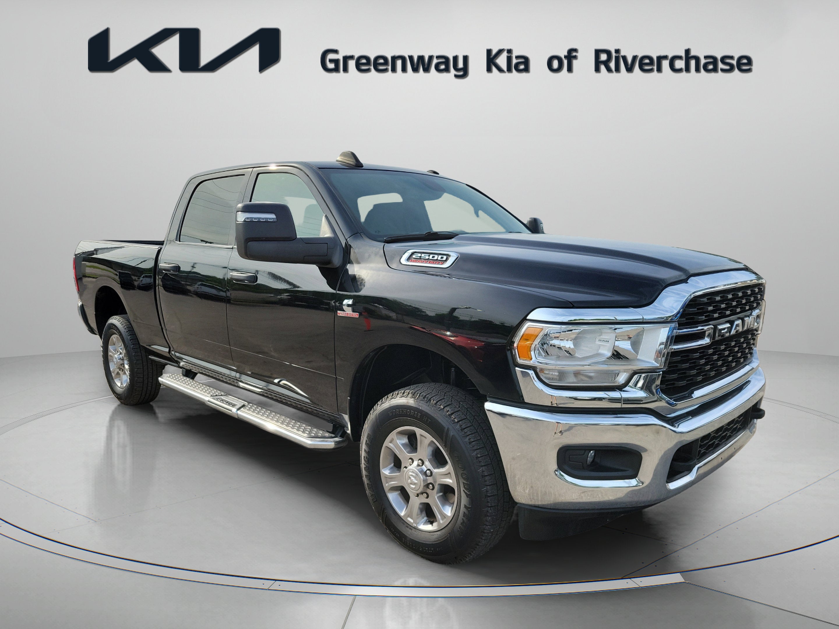 2024 RAM 2500 Big Horn in Diamond Black Crystal Pearlcoat — front three-quarter view