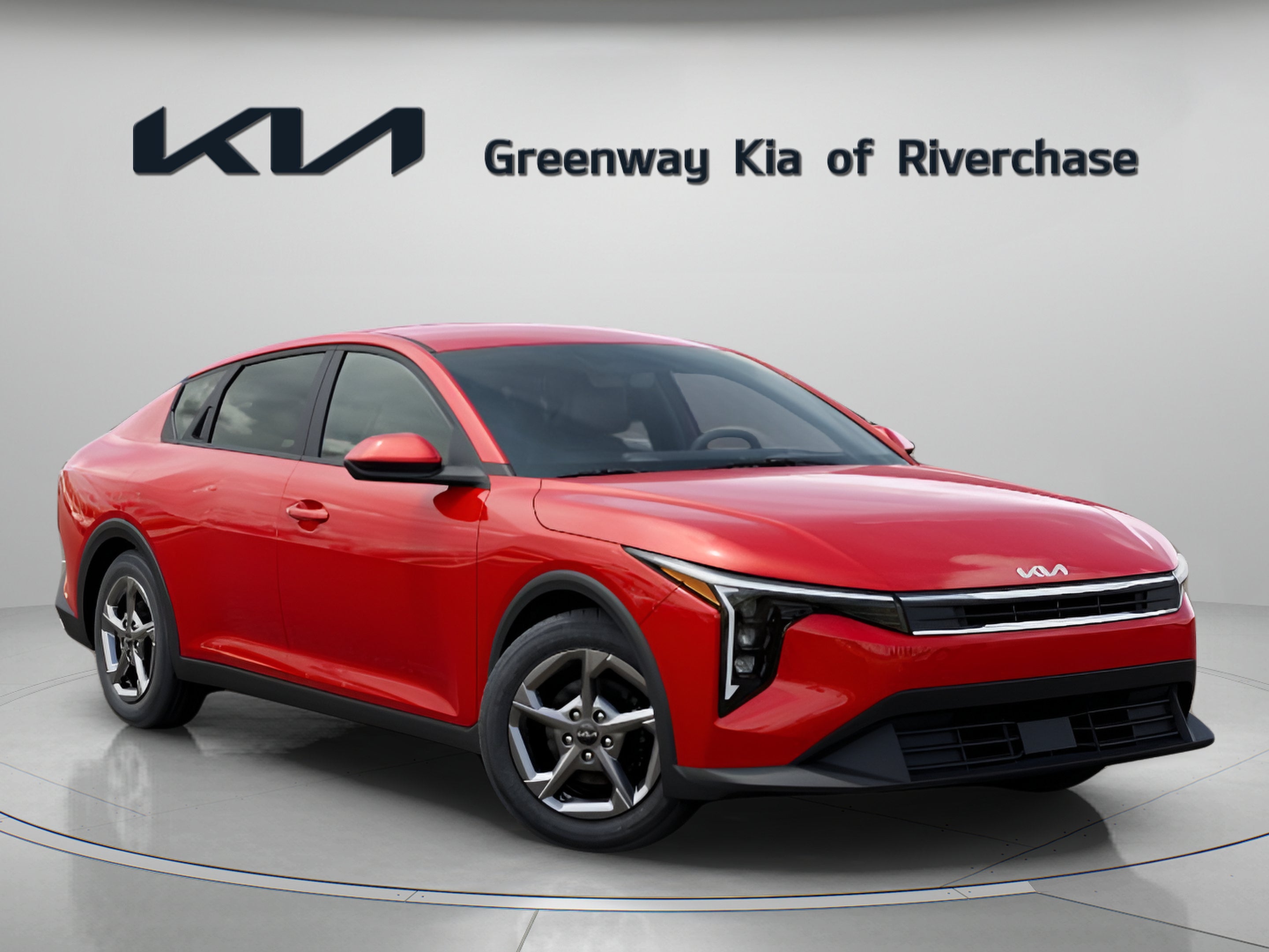 2026 Kia K4 LXS in Currant Red — front three-quarter view
