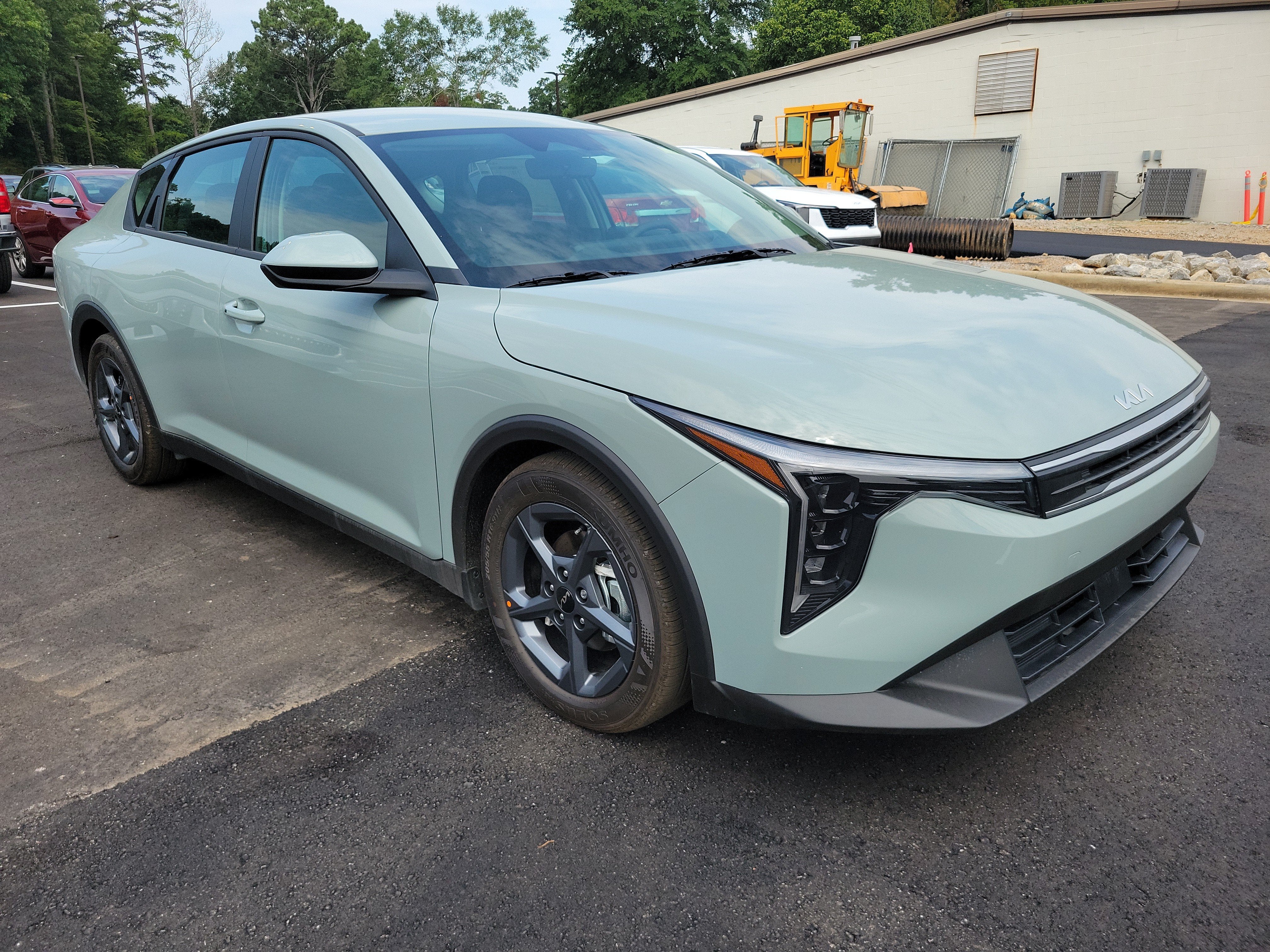 2026 Kia K4 LXS in Morning Haze — front three-quarter view