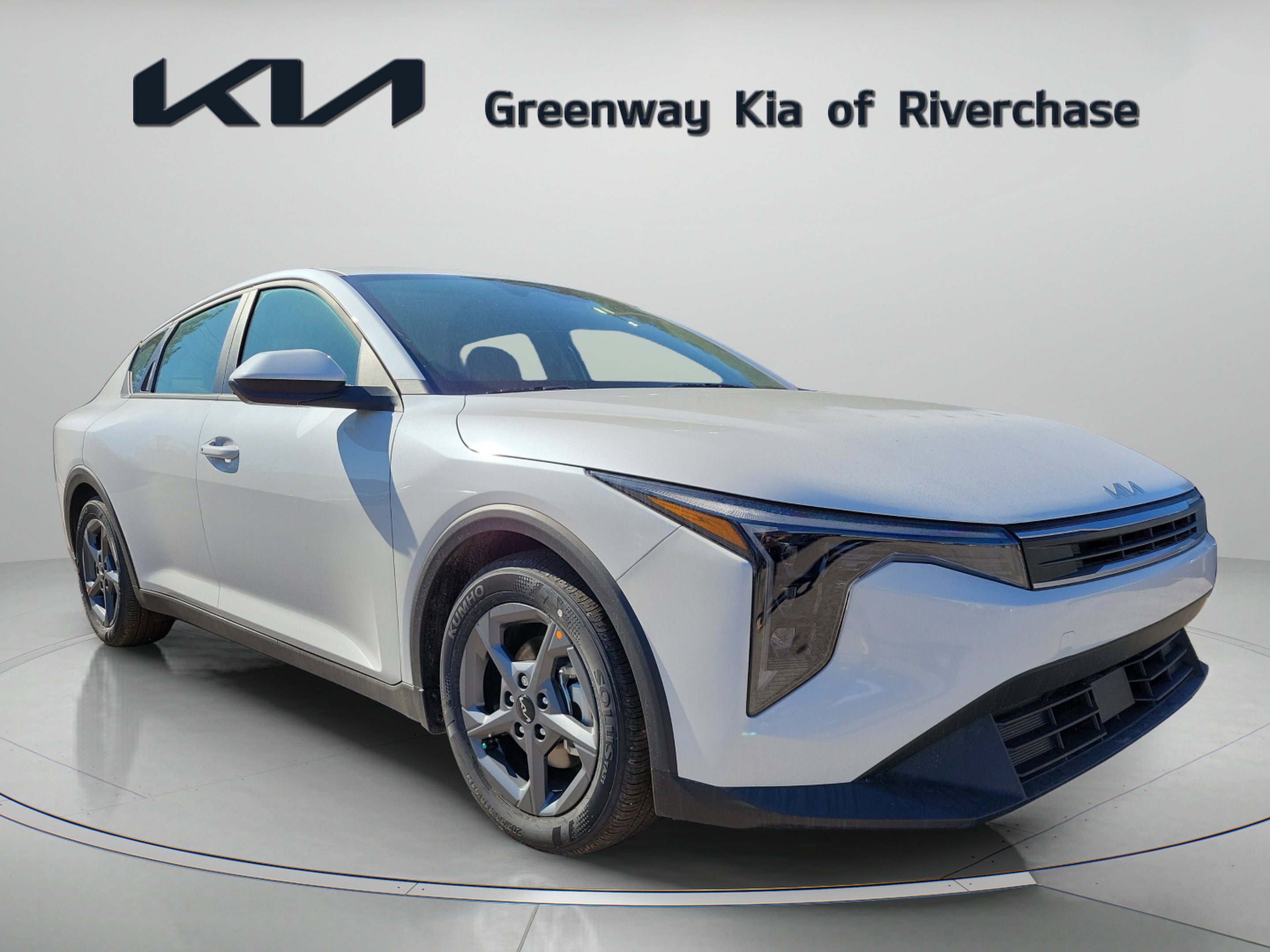 2025 Kia K4 LXS in Snow White Pearl — front three-quarter view