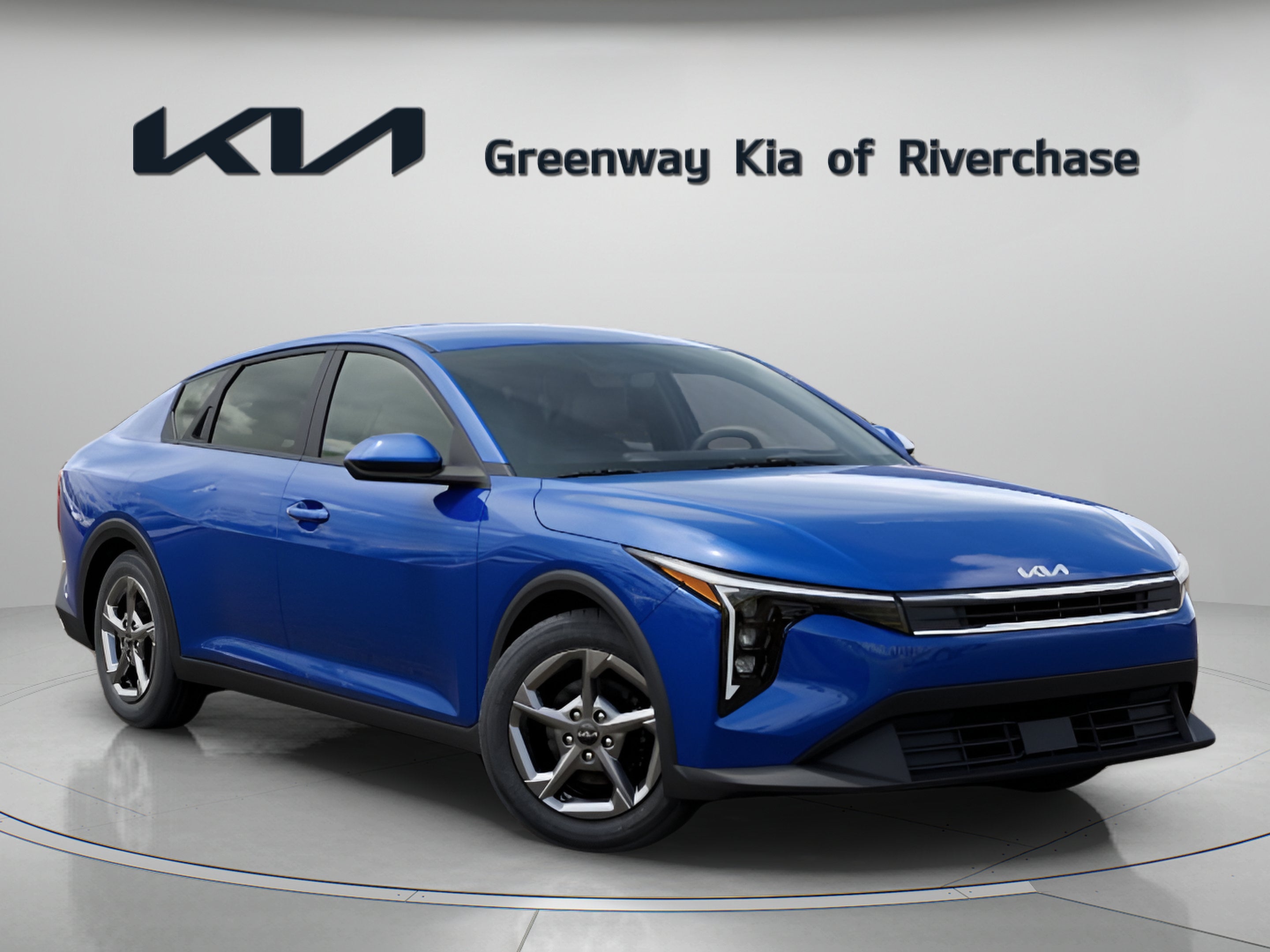 2026 Kia K4 LXS in Deep Sea Blue — front three-quarter view