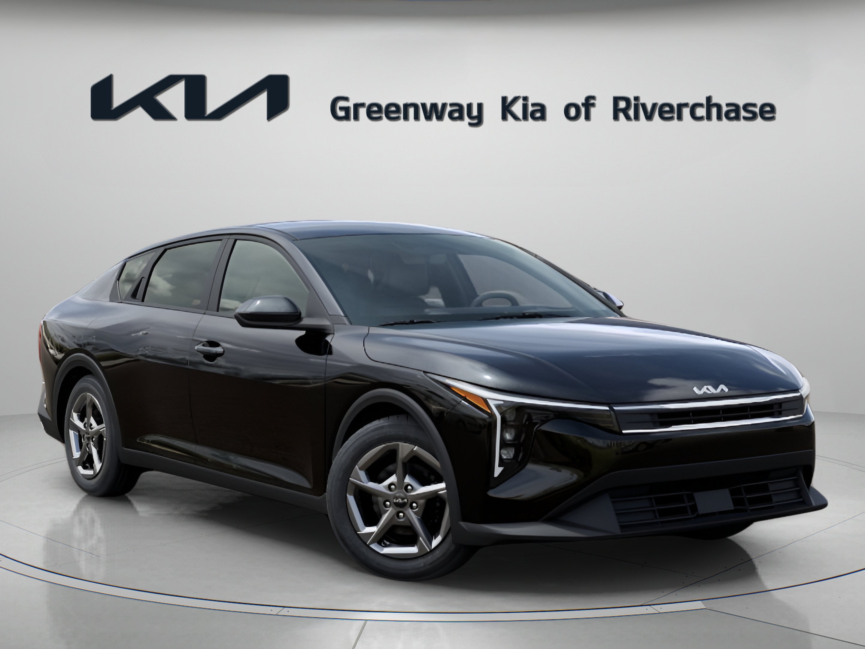 2026 Kia K4 LXS in Aurora Black Pearl — front three-quarter view