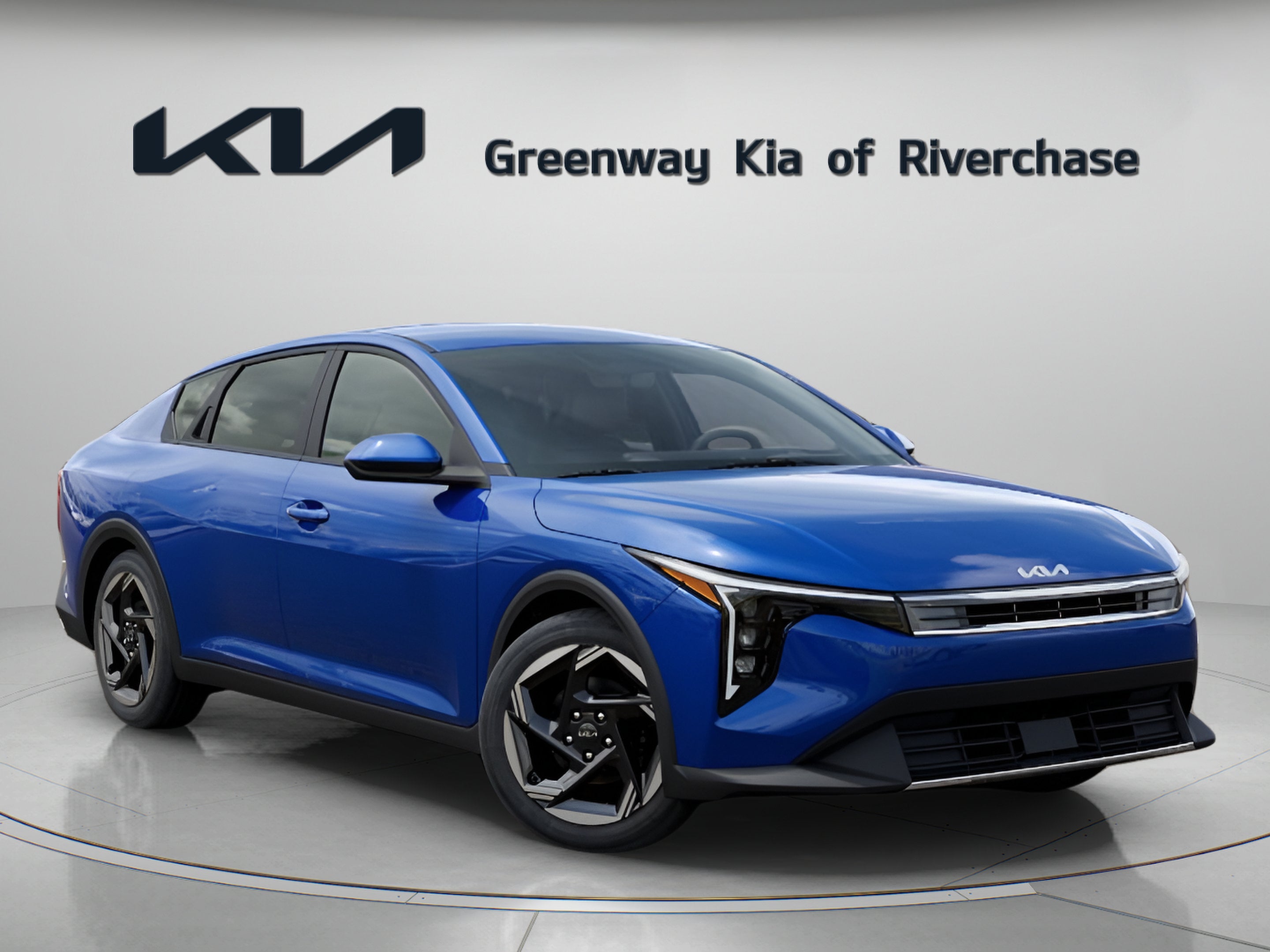 2026 Kia K4 EX in Deep Sea Blue — front three-quarter view