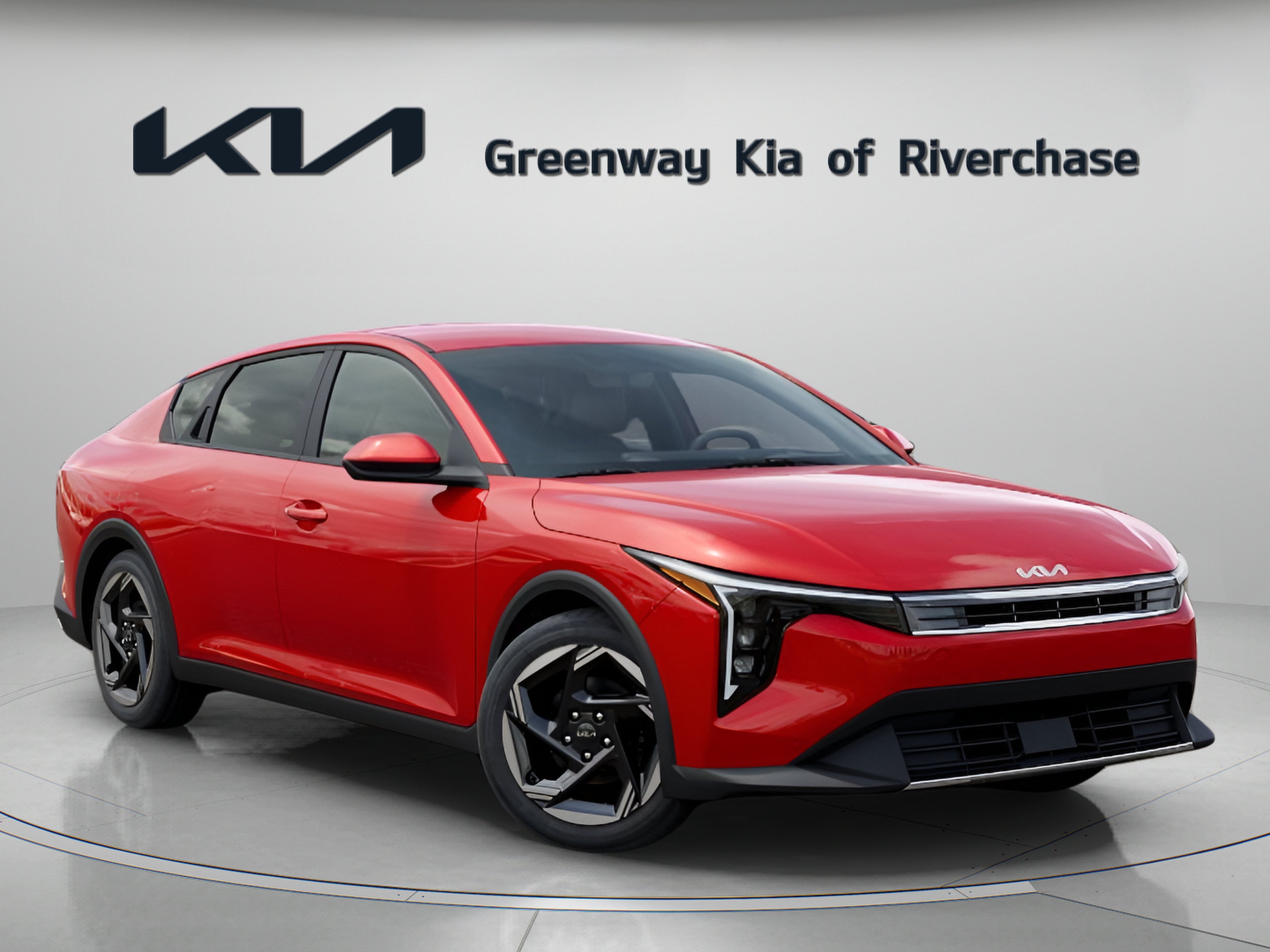2026 Kia K4 EX in Currant Red — front three-quarter view