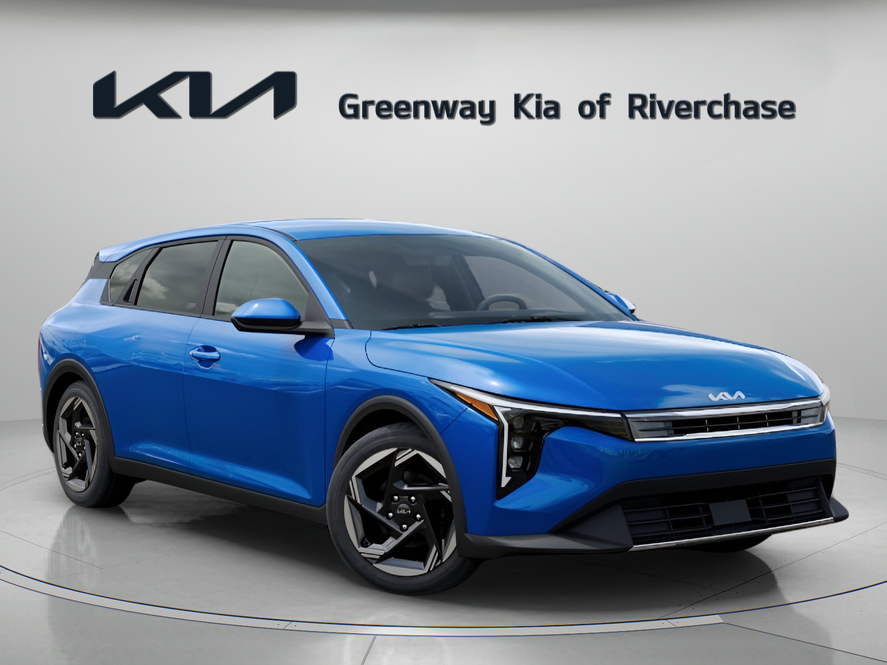 2026 Kia K4 EX in Wave Blue — front three-quarter view