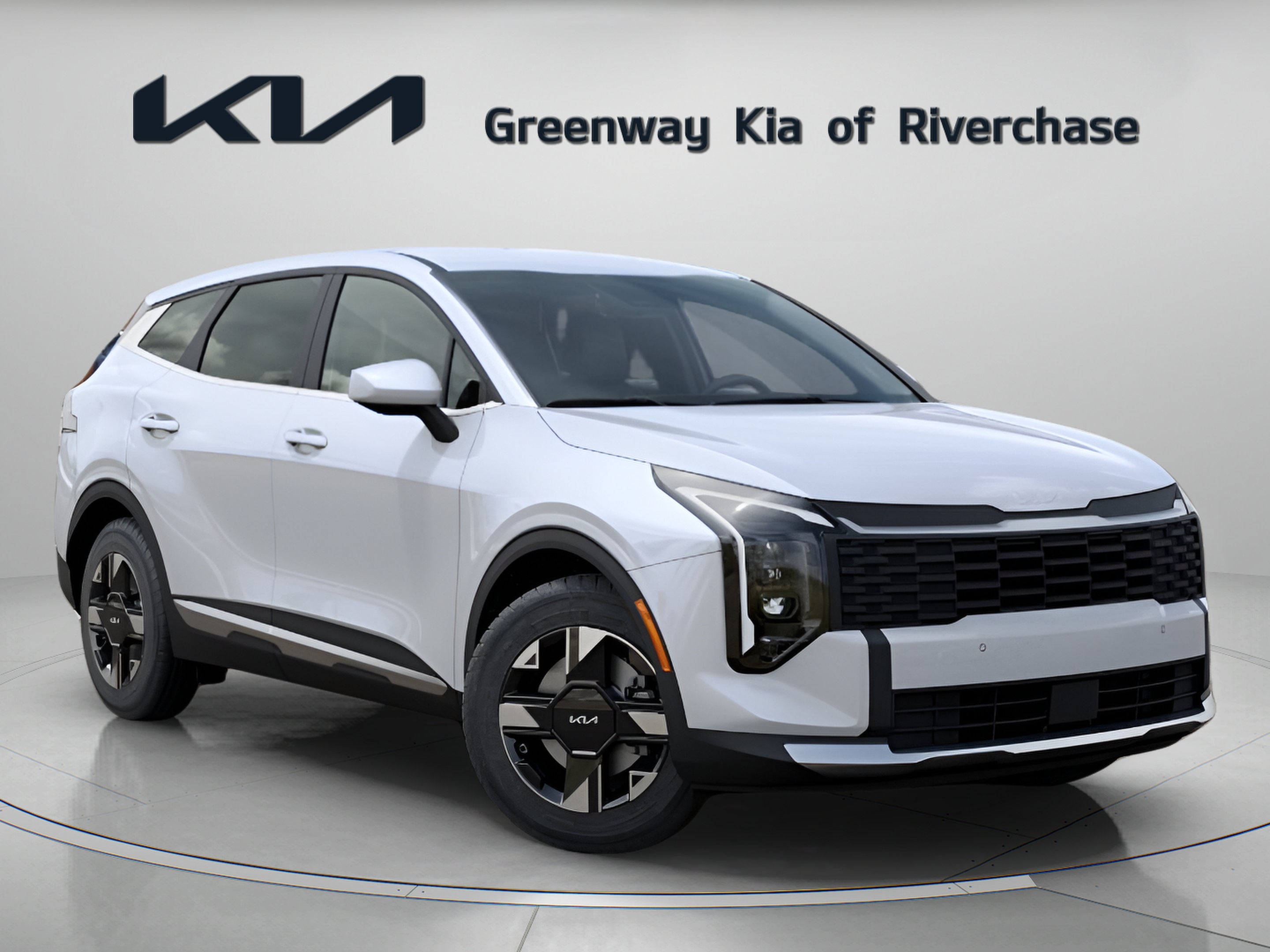 2026 Kia Sportage LX in Glacial White Pearl — front three-quarter view