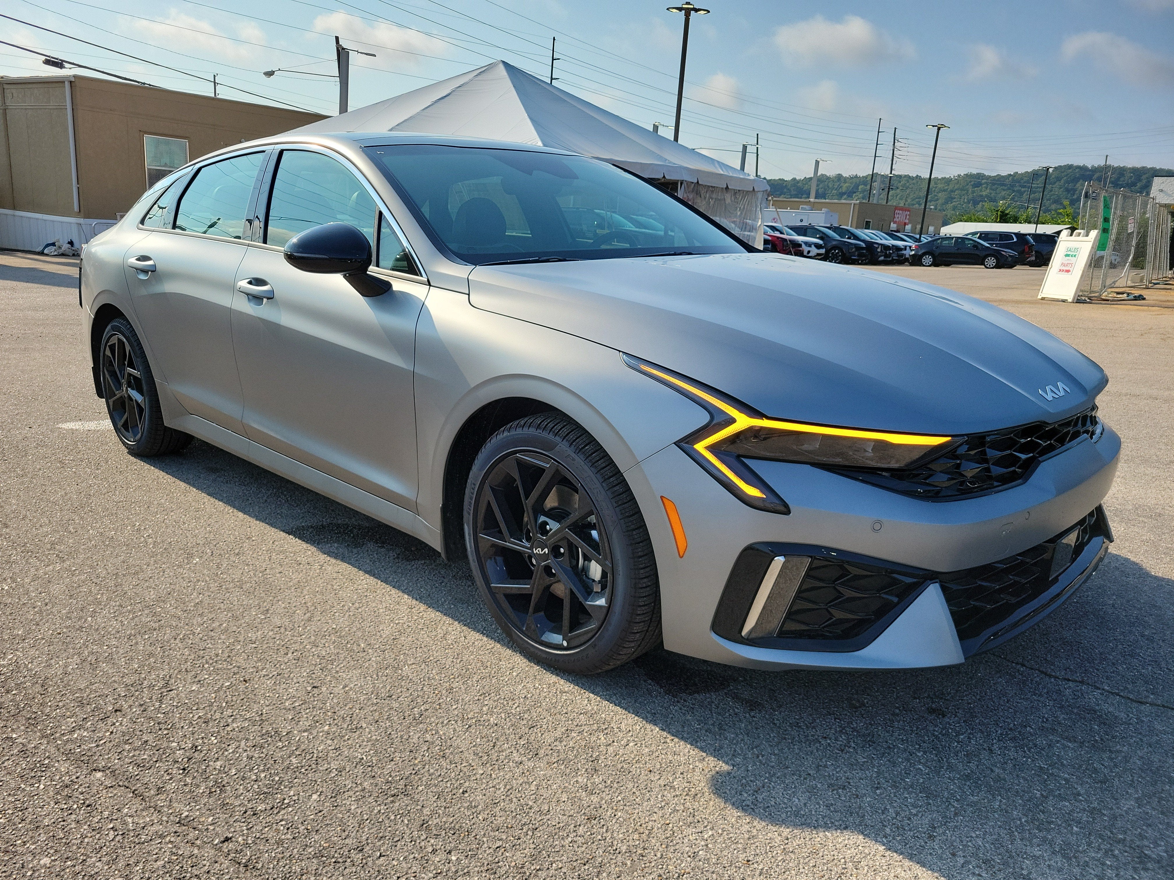 2026 Kia K5 GT-Line in Steel Matte Gray — front three-quarter view