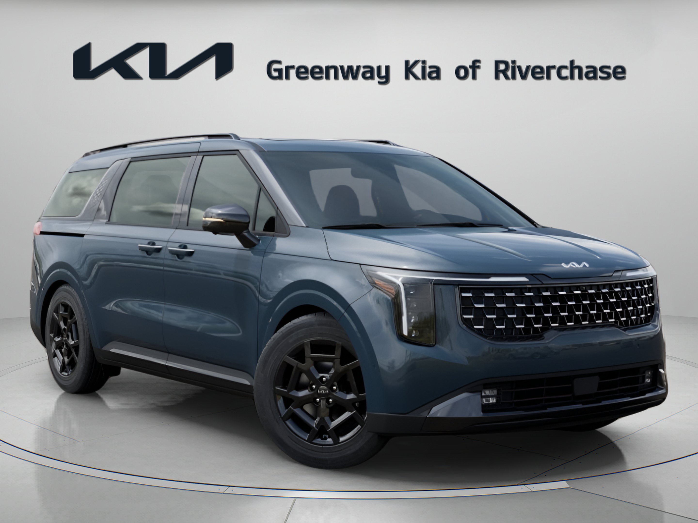 2026 Kia Carnival SX Prestige in Astra Blue — front three-quarter view