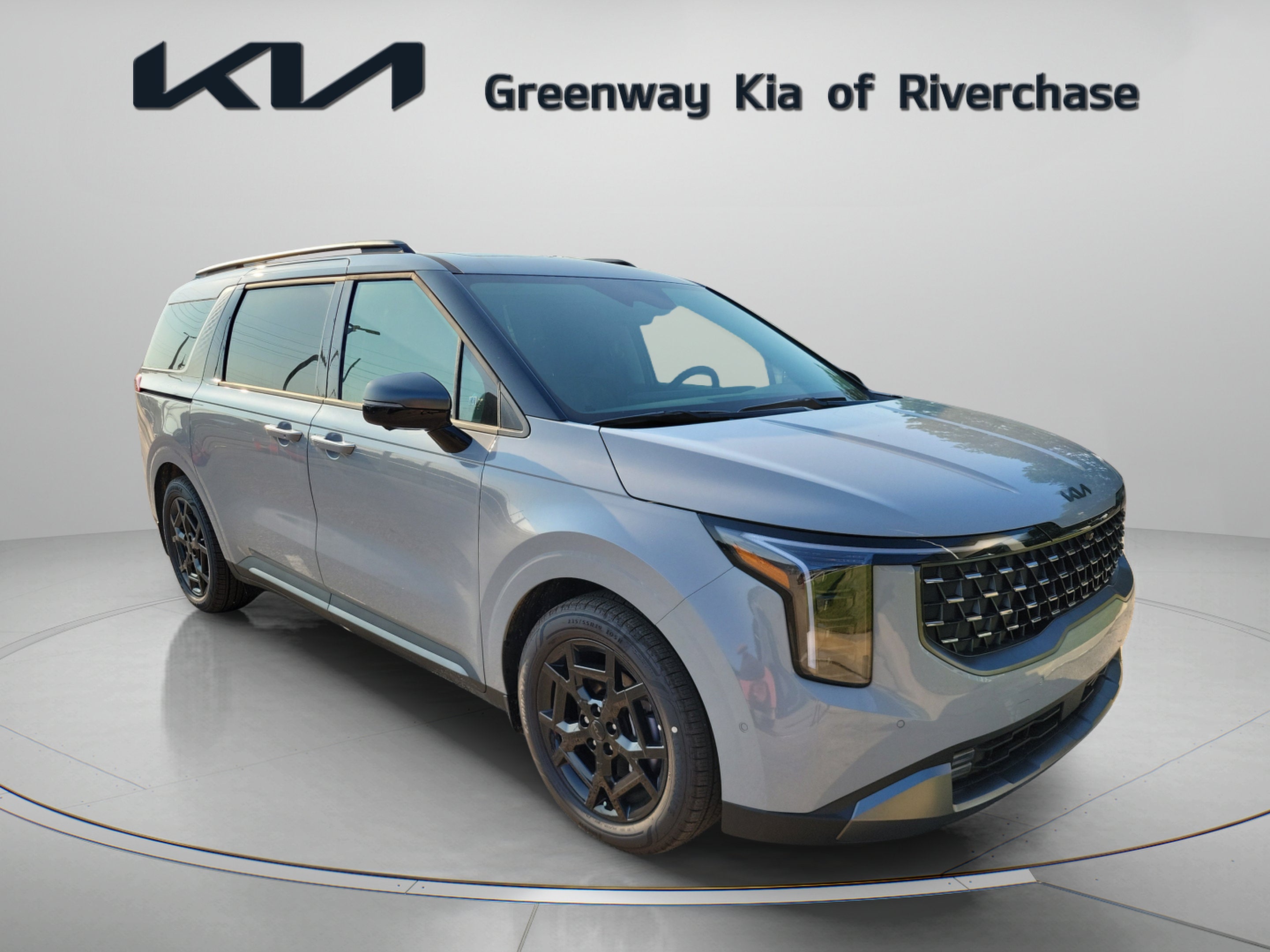 2026 Kia Carnival SX Prestige in Ceramic Silver — front three-quarter view