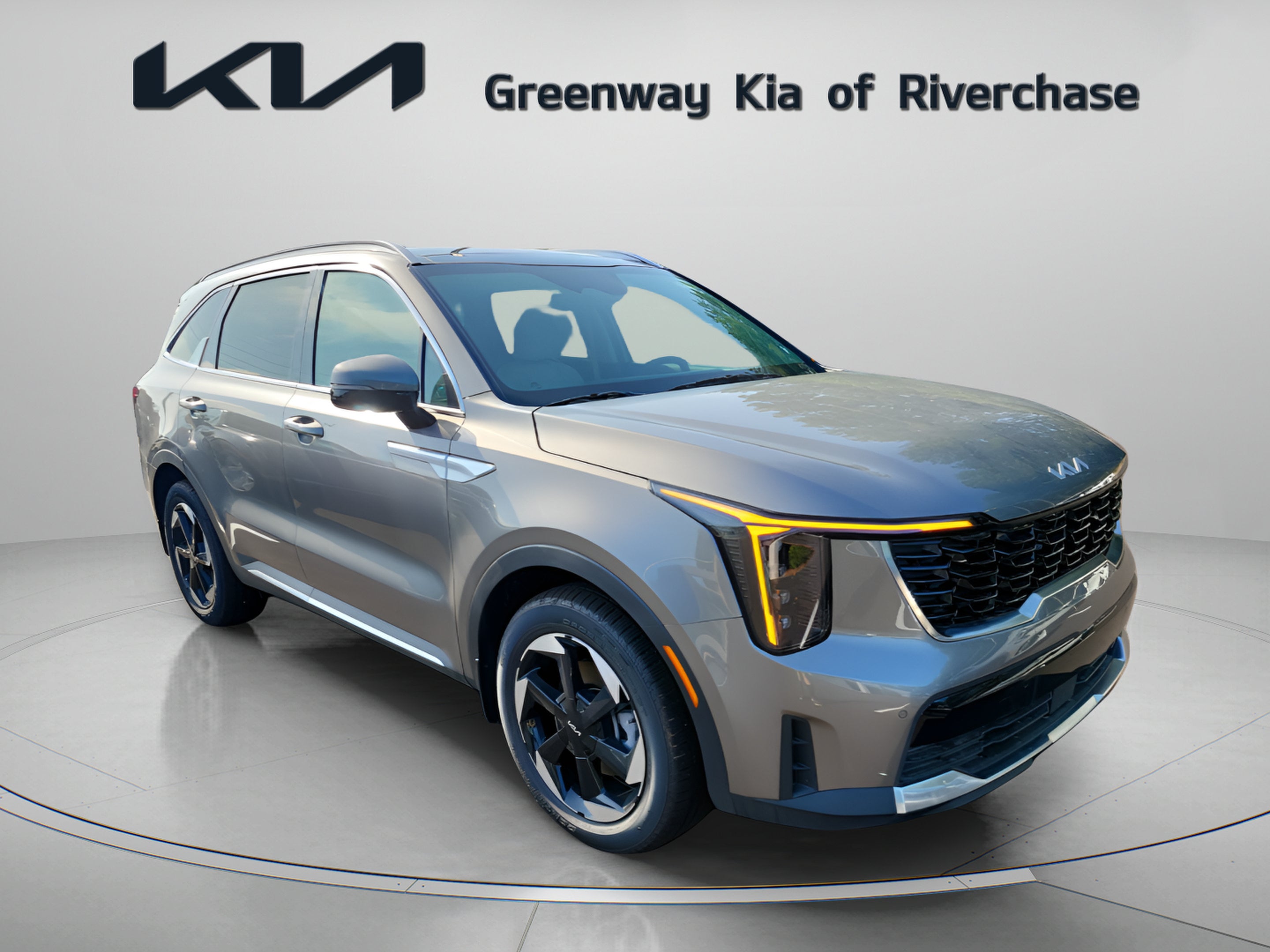 2026 Kia Sorento Hybrid EX in Volcanic Sand — front three-quarter view